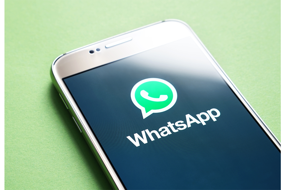 WhatsApp logo on smartphone
