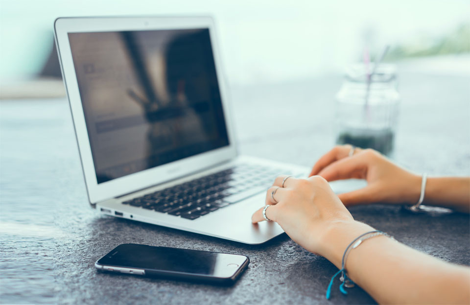 Woman Using Laptop