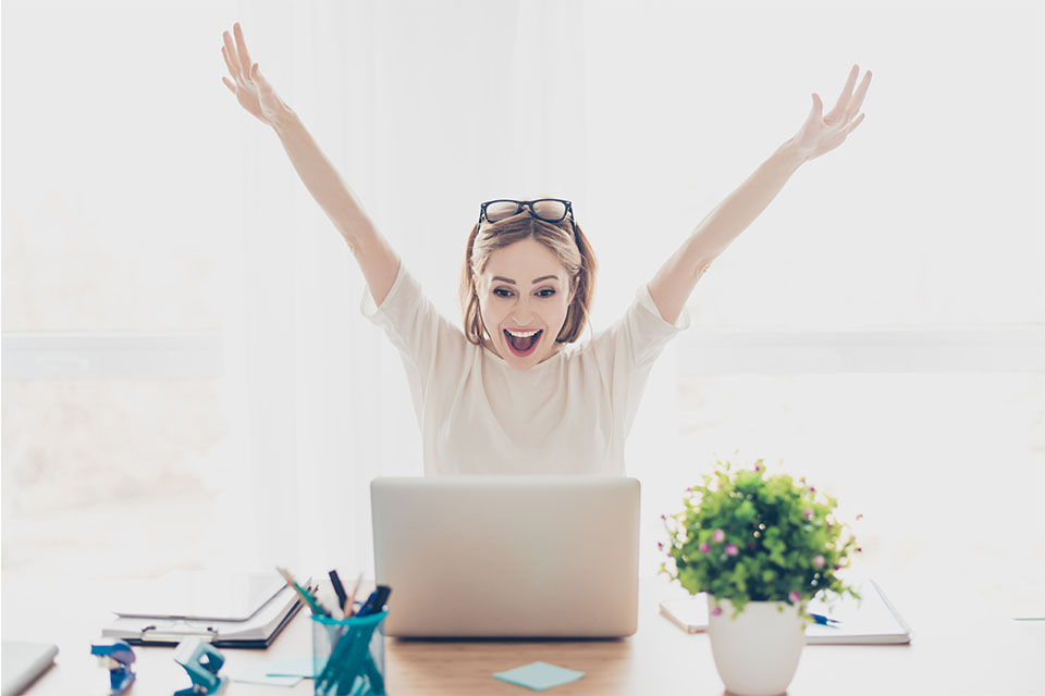 Happy Woman with Laptop