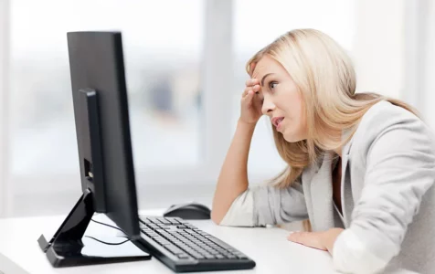 Stressed Woman in Front of Computer